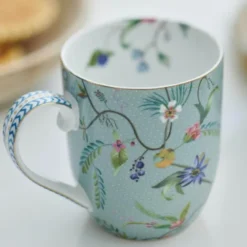 Jolie Flowers liten mugg 20 cl ljusblå