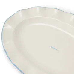 Serveringsfat med vågig kant 22x30 cm vit/blå