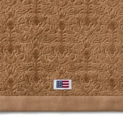 Velour jacquard handduk 30x50 cm ornament fudge