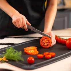 Vågtandad tomatkniv 11 cm grå
